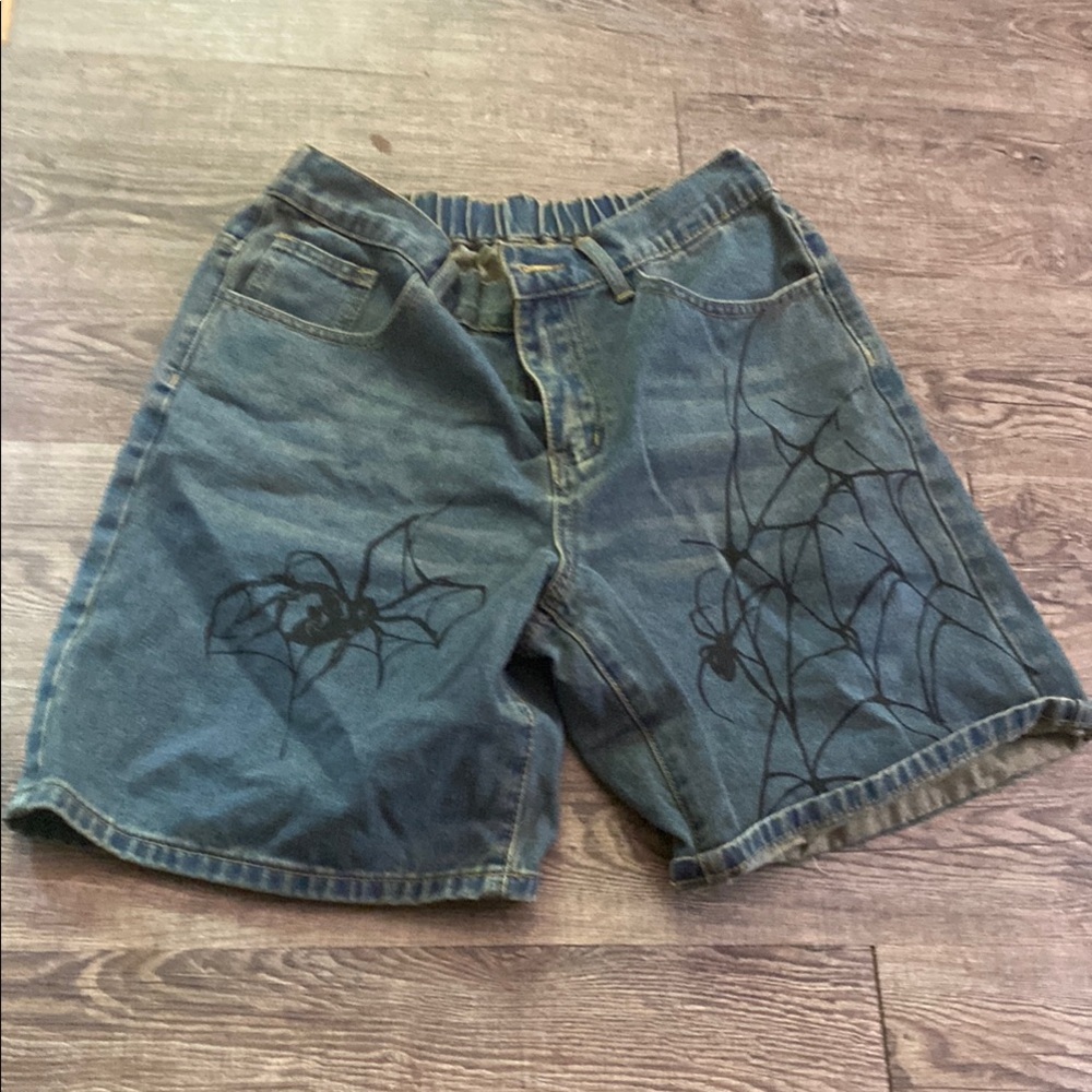 Woman’s Blue Denim Shorts with Spider Web Design
